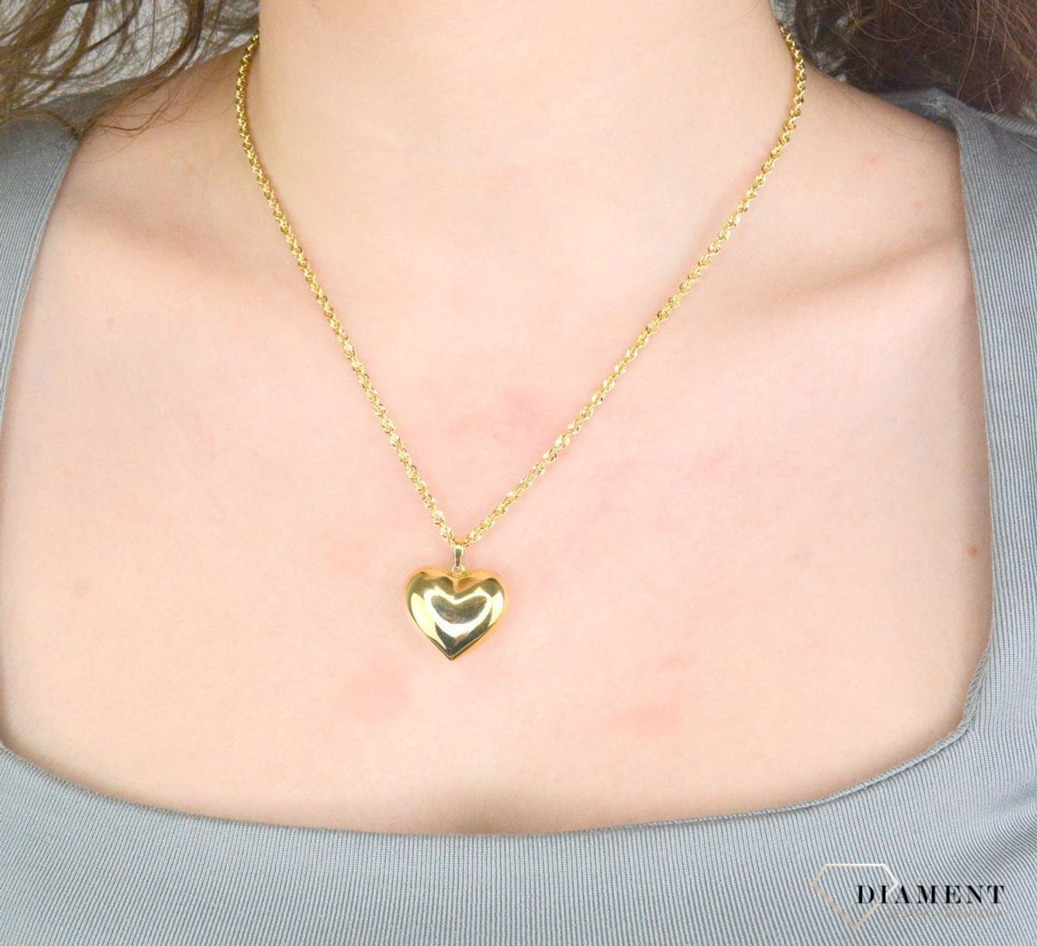 Zawieszka serce gładkie próba 585, DIA-ZAW-12152-585, Wisiorek został wykonany z wysokiej jakości złota próby 585. Złoto to jeden z najpopularniejszych kruszców, cenione przez kobiety na całym świecie1.jpg