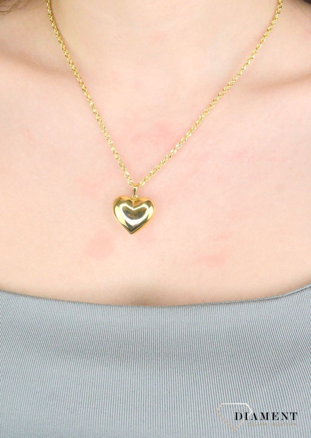 Zawieszka serce gładkie próba 585, DIA-ZAW-12152-585, Wisiorek został wykonany z wysokiej jakości złota próby 585. Złoto to jeden z najpopularniejszych kruszców, cenione przez kobiety na całym świecie1.jpg