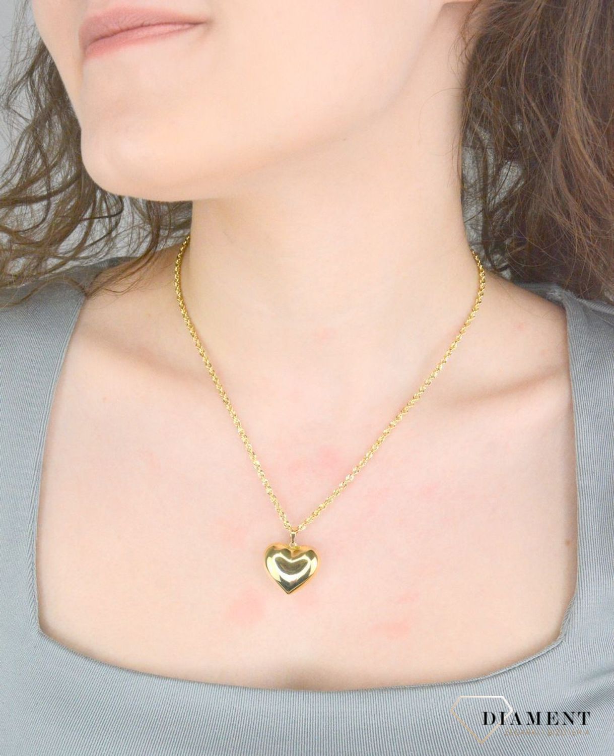 Zawieszka serce gładkie próba 585, DIA-ZAW-12152-585, Wisiorek został wykonany z wysokiej jakości złota próby 585. Złoto to jeden z najpopularniejszych kruszców, cenione przez kobiety na całym świecie1.jpg