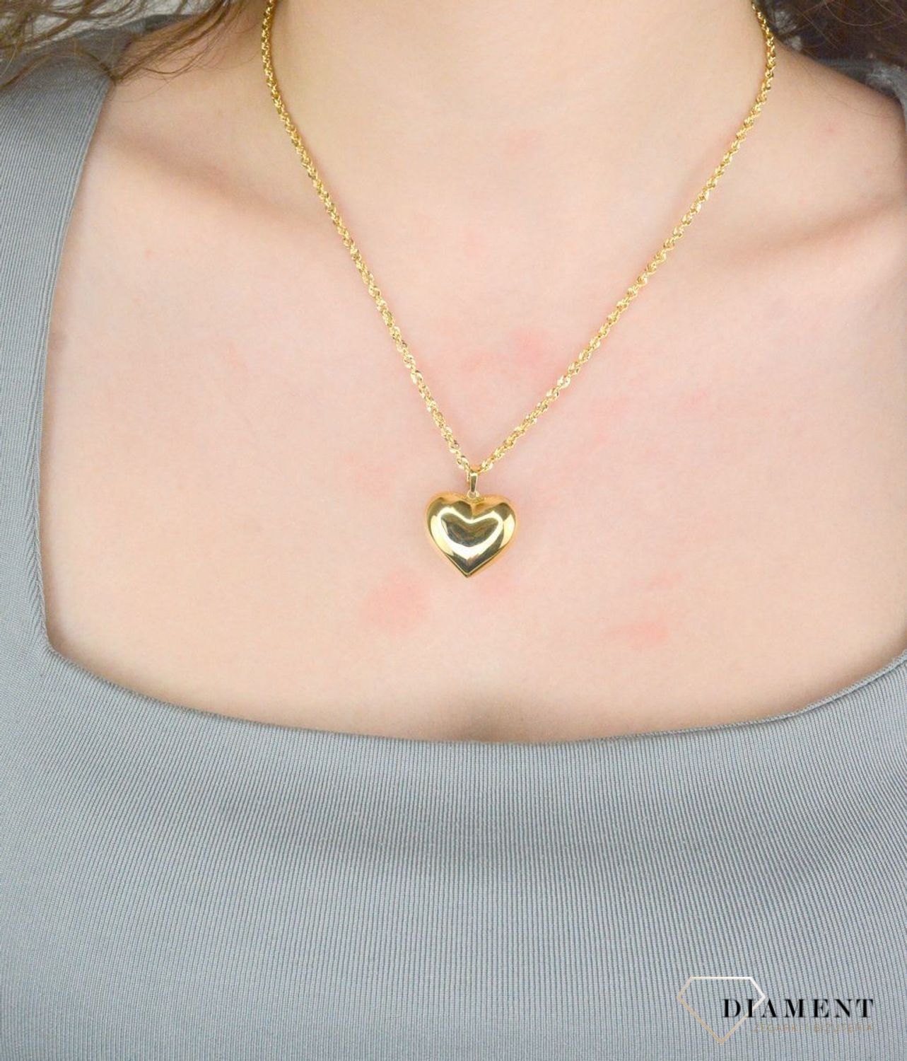 Zawieszka serce gładkie próba 585, DIA-ZAW-12152-585, Wisiorek został wykonany z wysokiej jakości złota próby 585. Złoto to jeden z najpopularniejszych kruszców, cenione przez kobiety na całym świecie1.jpg