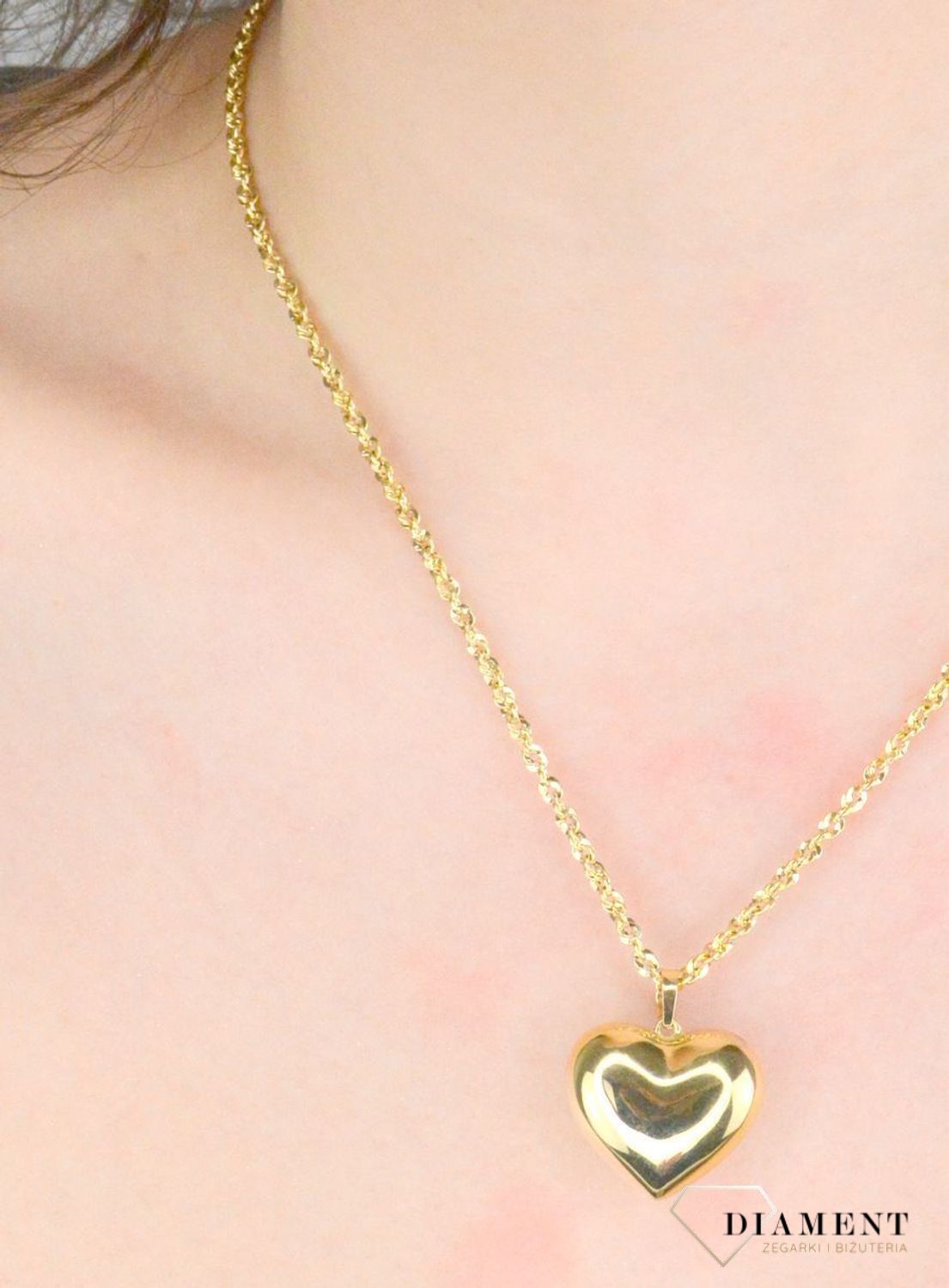 Zawieszka serce gładkie próba 585, DIA-ZAW-12152-585, Wisiorek został wykonany z wysokiej jakości złota próby 585. Złoto to jeden z najpopularniejszych kruszców, cenione przez kobiety na całym świecie1.jpg
