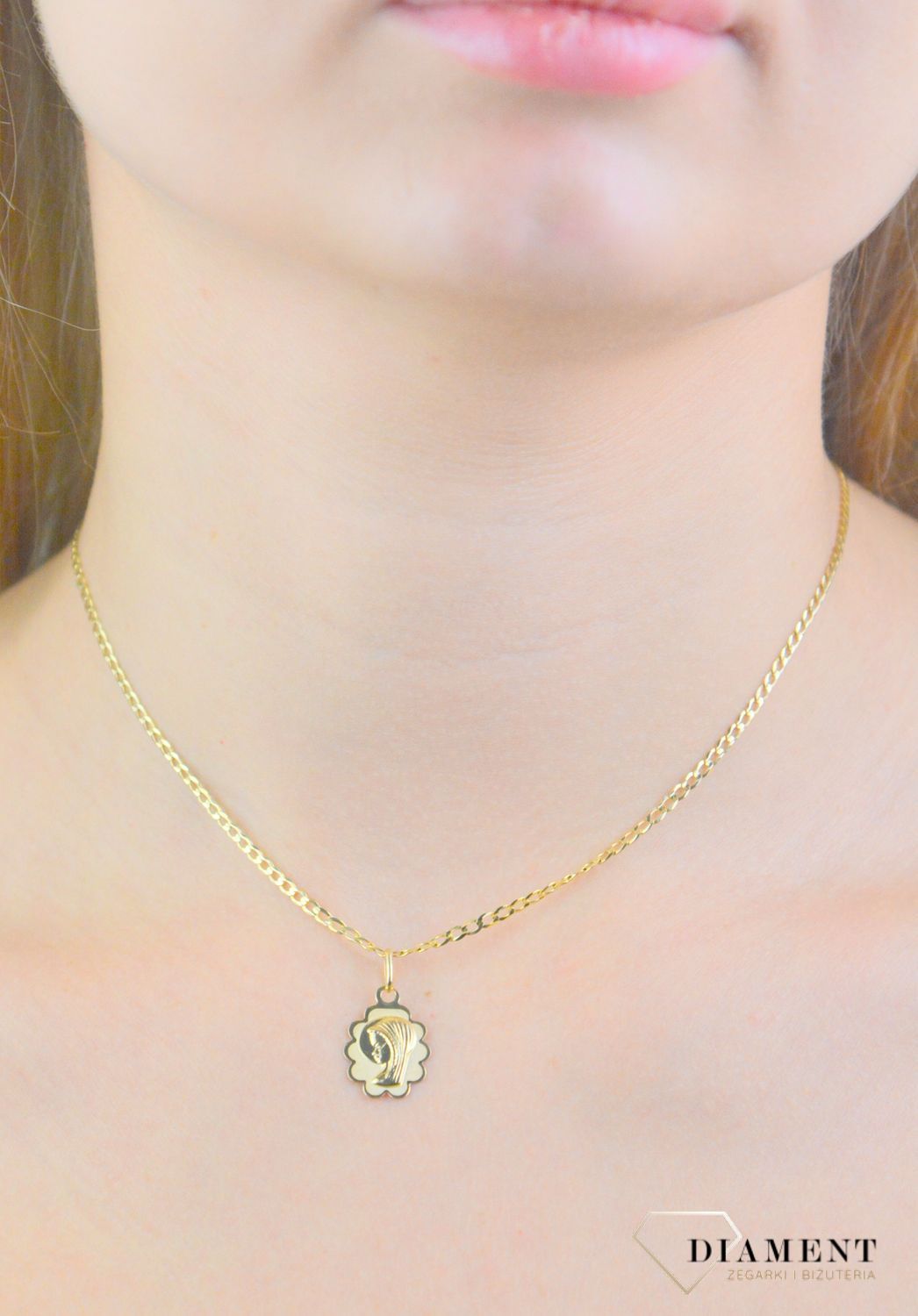 Zawieszka złota medalik matka boska próba 585, DIA-ZAW-12177-585 Złota zawieszka 585 medalik z Matką Boską. Medalik będący wspaniałą pamiątką i prezentem z okazji chrztu, komunii czy.jpg