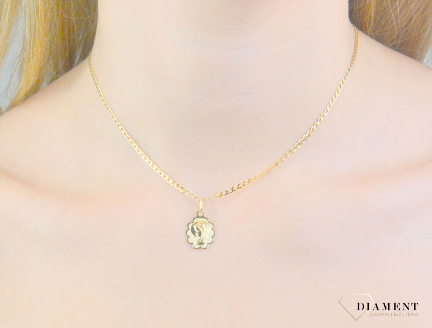 Zawieszka złota medalik matka boska próba 585, DIA-ZAW-12177-585 Złota zawieszka 585 medalik z Matką Boską. Medalik będący wspaniałą pamiątką i prezentem z okazji chrztu, komunii czy.jpg