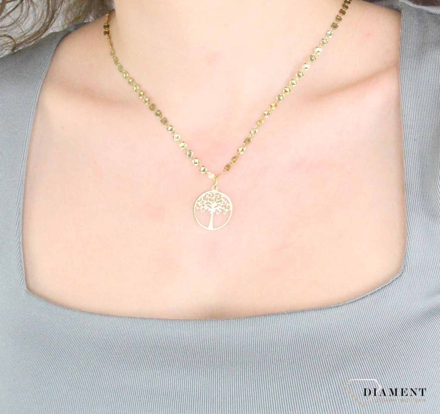 Zawieszka złota drzewko szczęścia próba 585, DIA-ZAW-12628-585 Wisiorek został wykonany z wysokiej jakości złota próby 585. Złoto to jeden z najpopularniejszych kruszców, cenione przez kobiety na.jpg