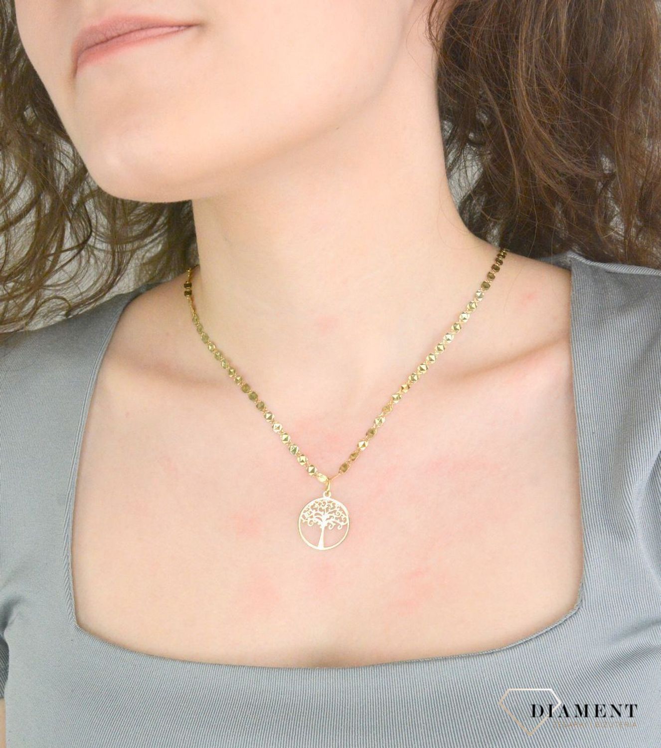 Zawieszka złota drzewko szczęścia próba 585, DIA-ZAW-12628-585 Wisiorek został wykonany z wysokiej jakości złota próby 585. Złoto to jeden z najpopularniejszych kruszców, cenione przez kobiety na.jpg