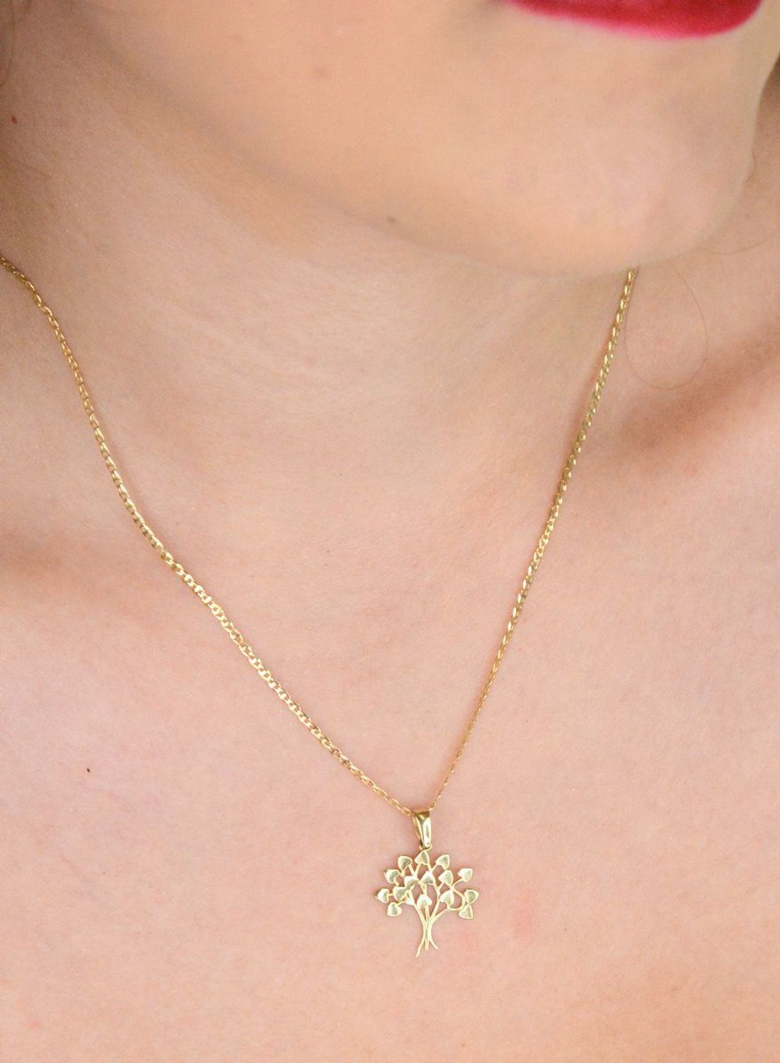 Złota zawieszka drzewko szczęścia z żółtego złota próby 585. Długość 2,2 cm, waga 0,99 g. Symbol pomyślności i harmonii – idealny prezent na każdą okazję.1.jpg