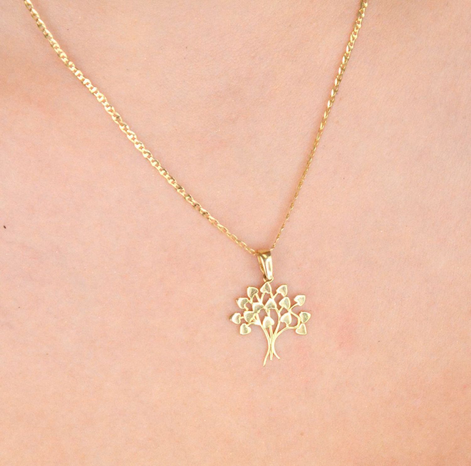 Złota zawieszka drzewko szczęścia z żółtego złota próby 585. Długość 2,2 cm, waga 0,99 g. Symbol pomyślności i harmonii – idealny prezent na każdą okazję.1.jpg