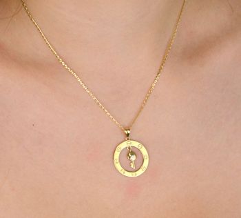 Złota zawieszka próby 585 z ruchomym kluczykiem w środku – symboliczna biżuteria idealna na prezent. Średnica 2,2 cm, waga 1,64 g. Sprawdź! (5).JPG