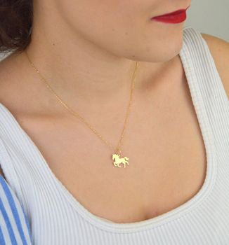 Stylowa zawieszka złota próby 585, model DIA-ZAW-13686-585 w kształcie konia. Wymiary 1,8 x 1,5 cm, waga 0,54 g. Idealna na prezent lub do codziennego noszenia (1).JPG