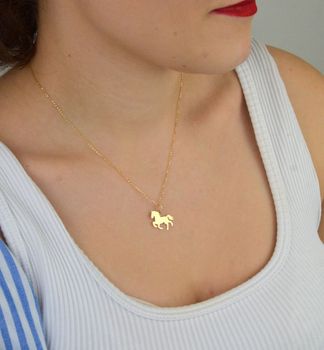 Stylowa zawieszka złota próby 585, model DIA-ZAW-13686-585 w kształcie konia. Wymiary 1,8 x 1,5 cm, waga 0,54 g. Idealna na prezent lub do codziennego noszenia (3).JPG