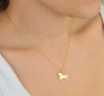 Stylowa zawieszka złota próby 585, model DIA-ZAW-13686-585 w kształcie konia. Wymiary 1,8 x 1,5 cm, waga 0,54 g. Idealna na prezent lub do codziennego noszenia (6).JPG