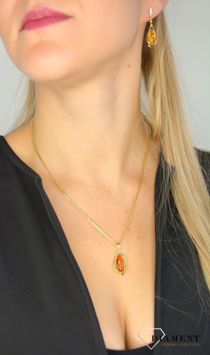 Złota zawieszka 585 bursztyn w kształcie łezki DIA-ZAW-1372-585.jpg