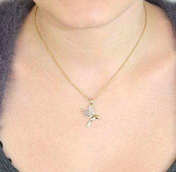 Subtelna zawieszka srebrna koliber próby 333, zdobiona białym złotem. Wymiary 2,5×2,0 cm, waga 1,07 g. Idealna do codziennej elegancji lub prezentu (2).JPG