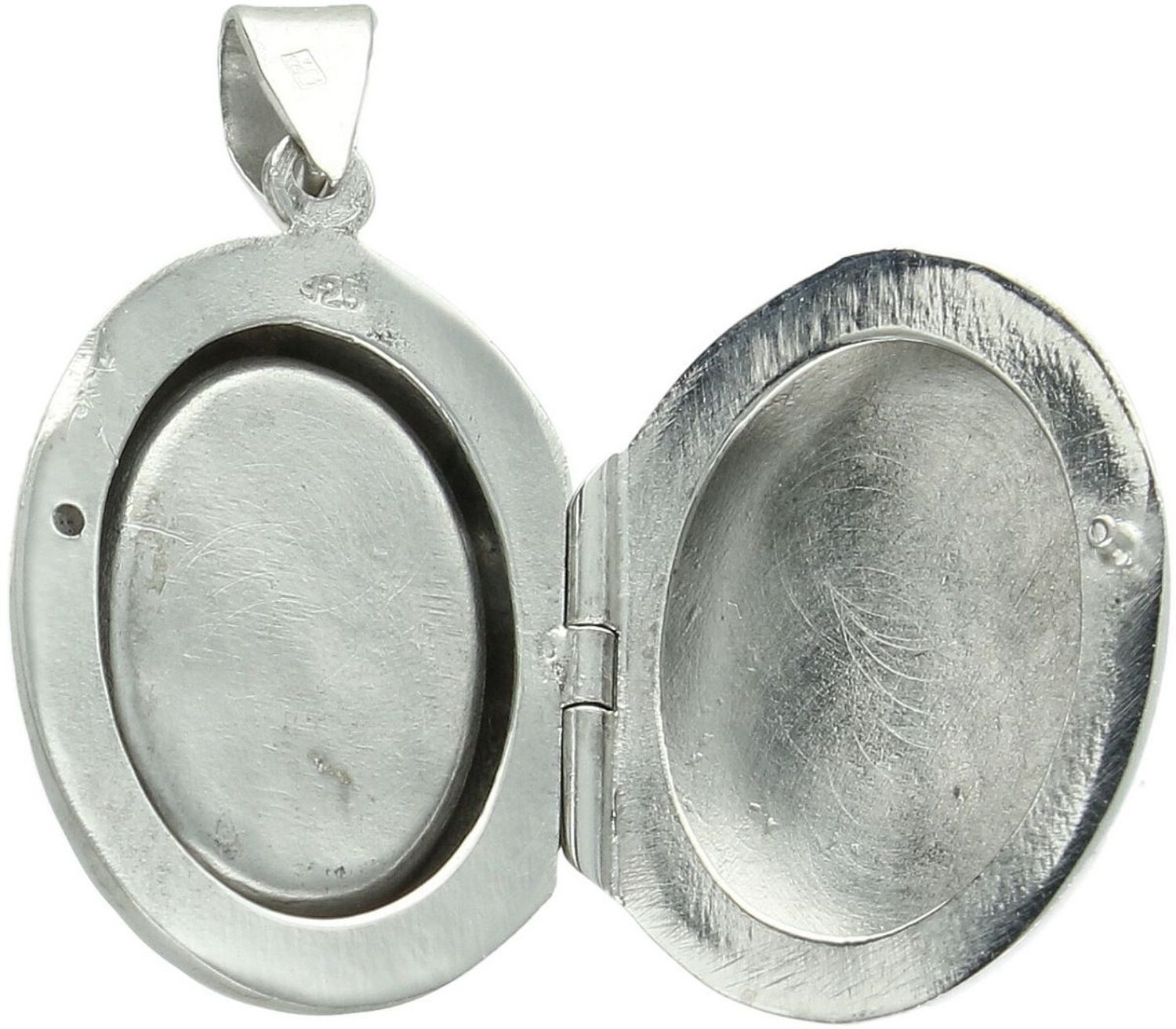 Zawieszka srebrna próby 925 w kształcie owalu, otwierana, z fioletową cyrkonią z jednej strony i gładką powierzchnią z drugiej. Model DIA-ZAW-13907-925, długość z oczkiem 3,5 cm, szerokość 2,1 1.jpg