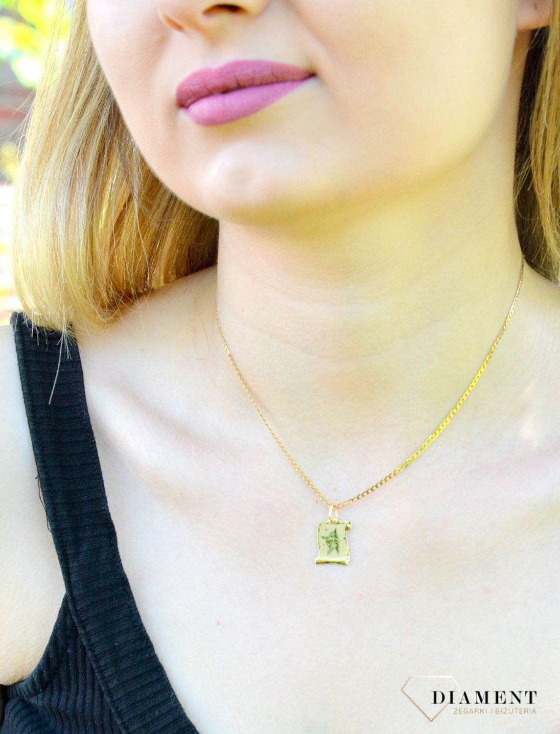 Złota zawieszka znak zodiaku Strzelec DIA-ZAW-1430-585.  Zawieszka została wykonana ze złota próby 585.Zawieszka będzie pięknym prezentem dla bliskiej osoby spod znaku strzelca. W naszej ofercie dostępne są także naszyjniki i.jpg