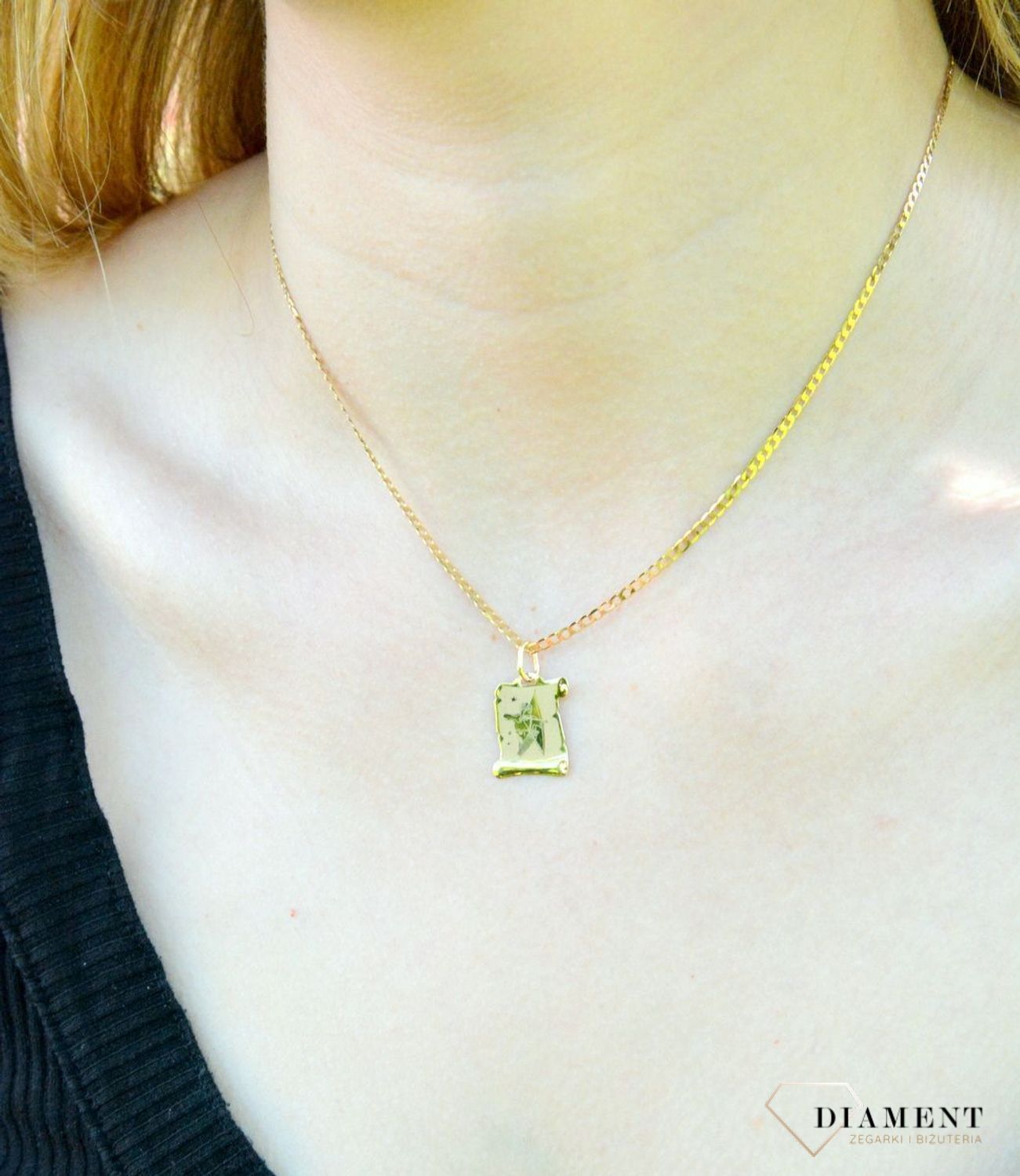 Złota zawieszka znak zodiaku Strzelec DIA-ZAW-1430-585.  Zawieszka została wykonana ze złota próby 585.Zawieszka będzie pięknym prezentem dla bliskiej osoby spod znaku strzelca. W naszej ofercie dostępne są także naszyjniki i.jpg