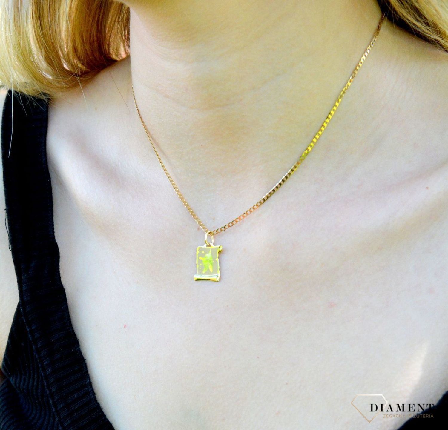 Złota zawieszka znak zodiaku Strzelec DIA-ZAW-1430-585.  Zawieszka została wykonana ze złota próby 585.Zawieszka będzie pięknym prezentem dla bliskiej osoby spod znaku strzelca. W naszej ofercie dostępne są także naszyjniki i.jpg