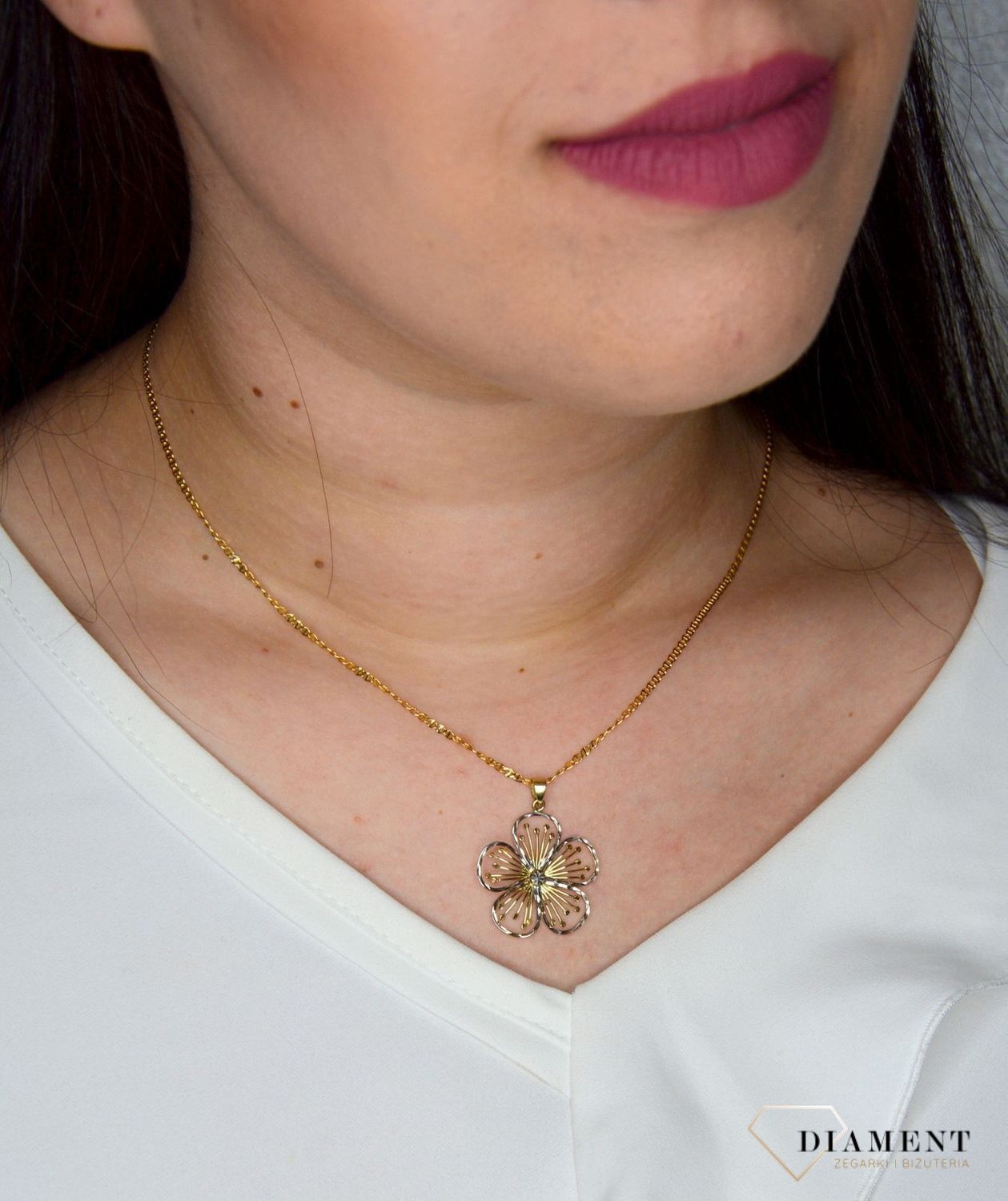 Złota zawieszka 333 kwiatek ażurowy DIA-ZAW-2405-333.jpg