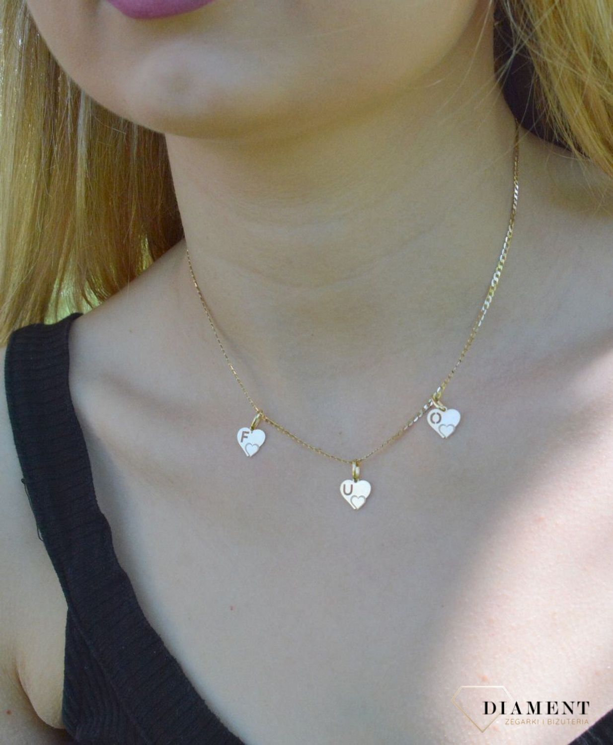 Złota zawieszka 585 literka F w serduszku DIA-ZAW-2607F-585. Wisiorek został wykonany z najwyższej jakości złota próby 585 . Złoto to jeden z najpopularniejszych kruszców, cenione przez kobiety na całym świecie i często wykorz.jpg