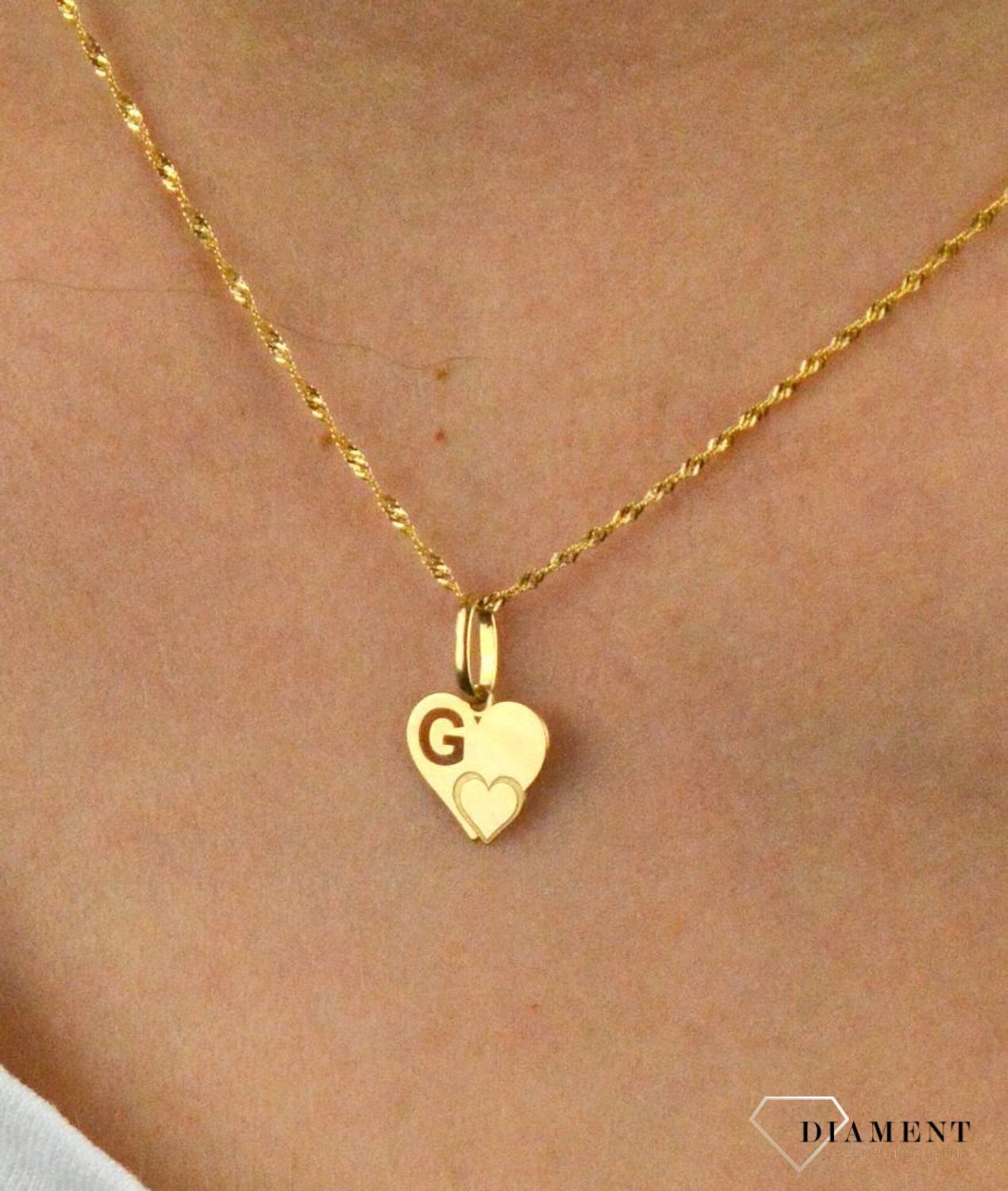Złota zawieszka serce z literką G DIA-ZAW-2607G-585.jpg