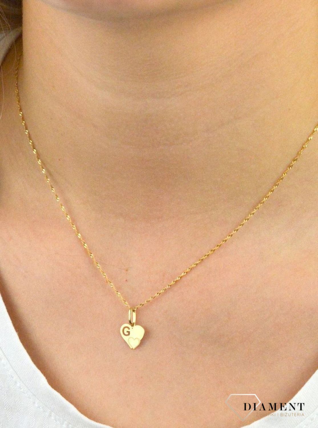 Złota zawieszka serce z literką G DIA-ZAW-2607G-585.jpg
