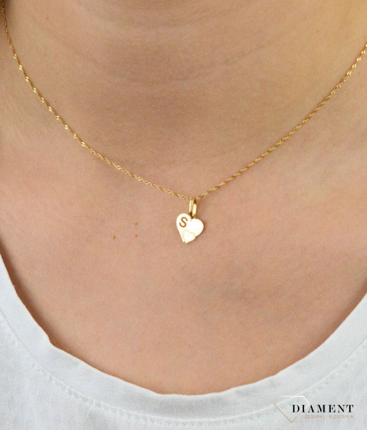Złota zawieszka serce z literką S DIA-ZAW-2607S-585.jpg