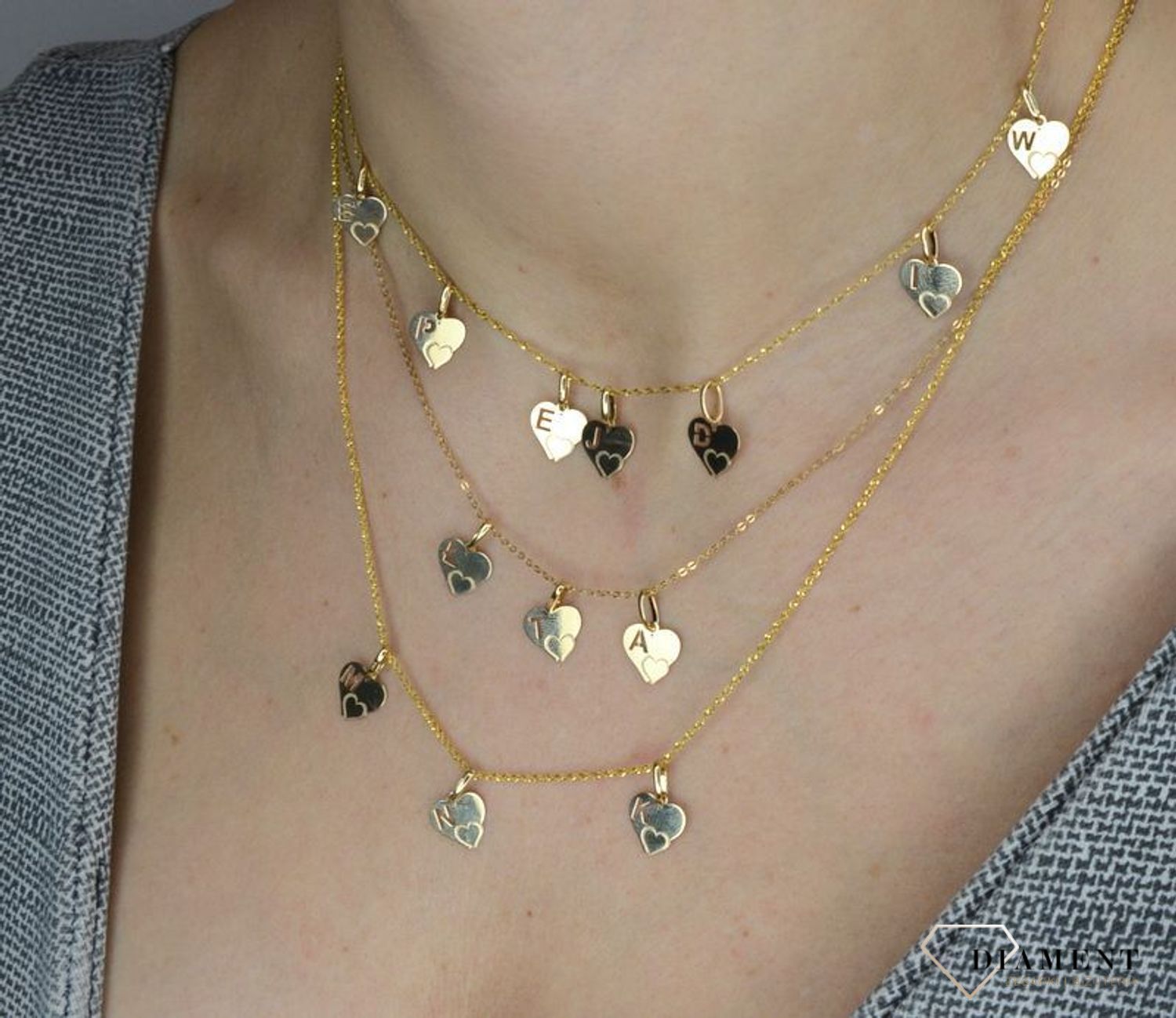 Złota zawieszka 585 serce z literką W DIA-ZAW-2607W-585.jpg