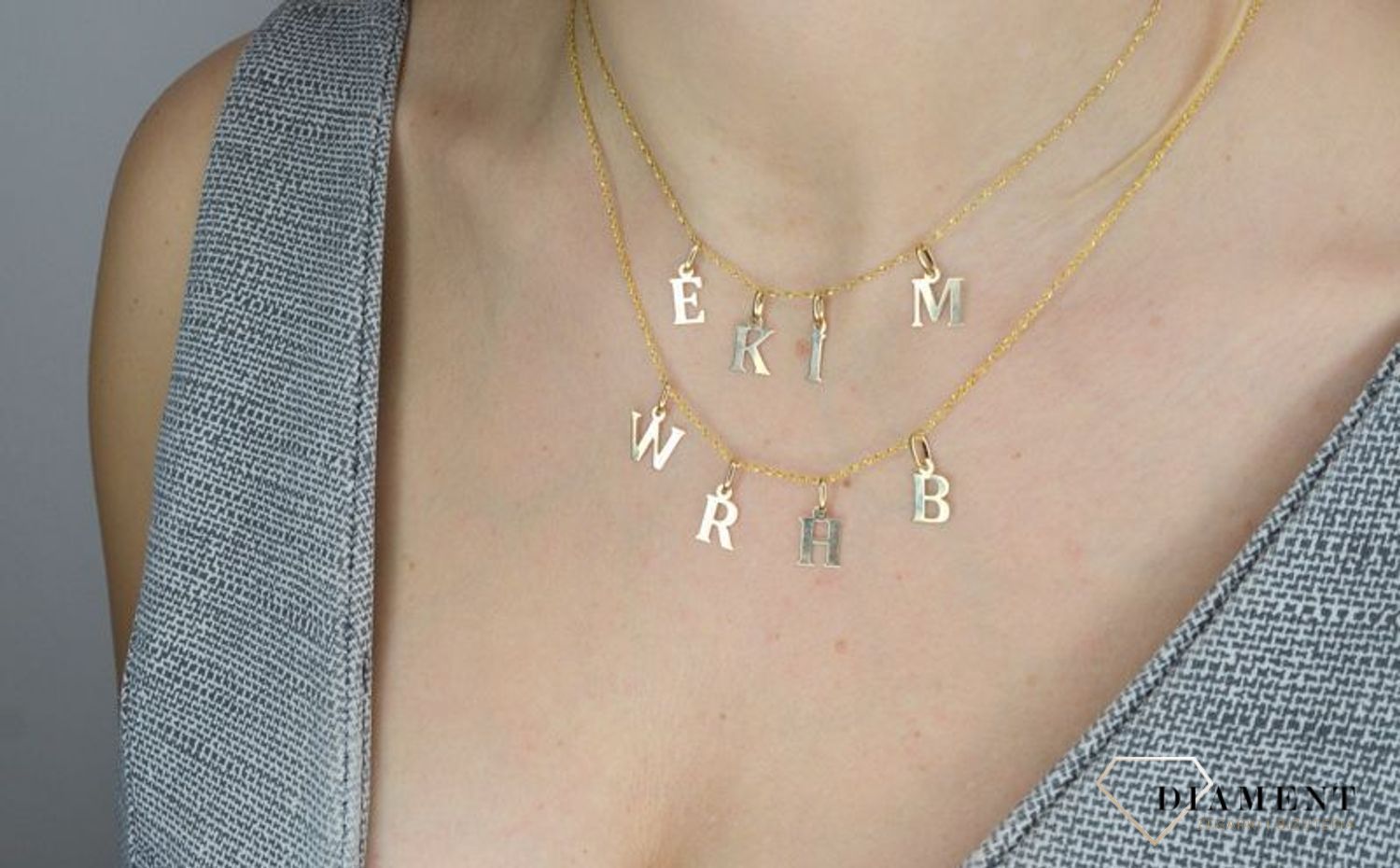 Złota zawieszka 585 literka W DIA-ZAW-2692W-585.jpg