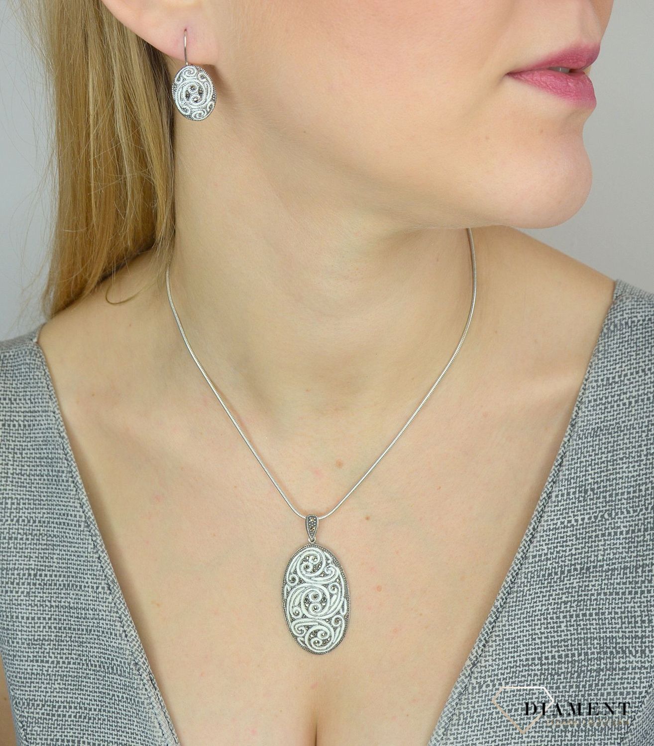 Zawieszka srebrna z markazytami i białą emalią.jpg