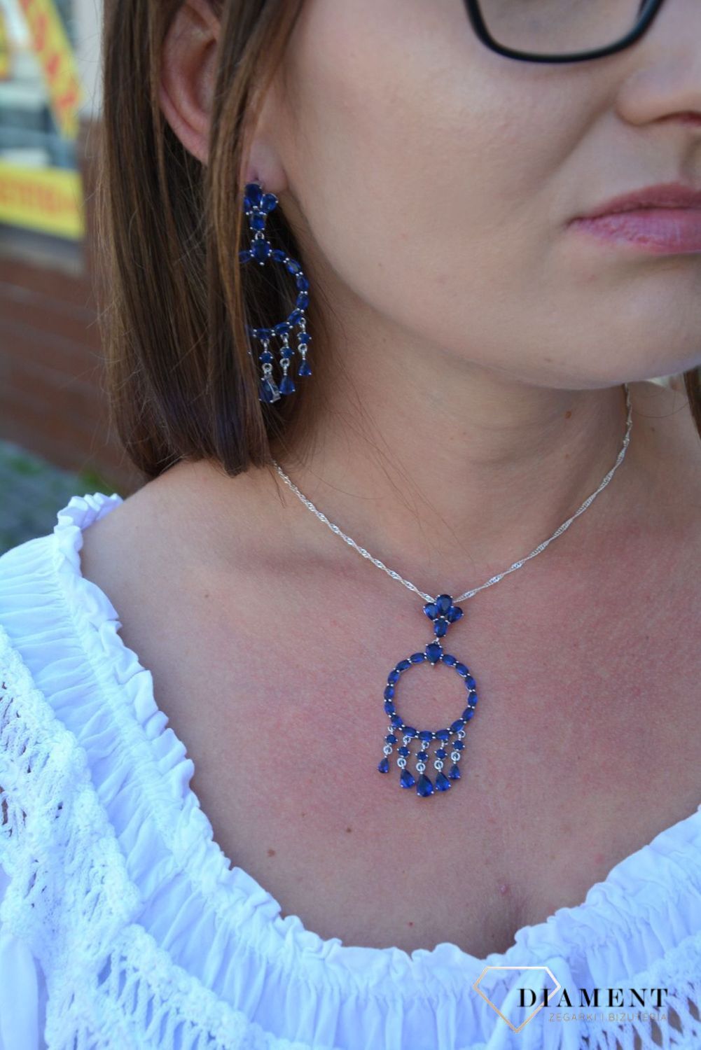 Srebrna zawieszka z wiszącymi elementami niebieskie cyrkonie DIA-ZAW-3097-925.jpg