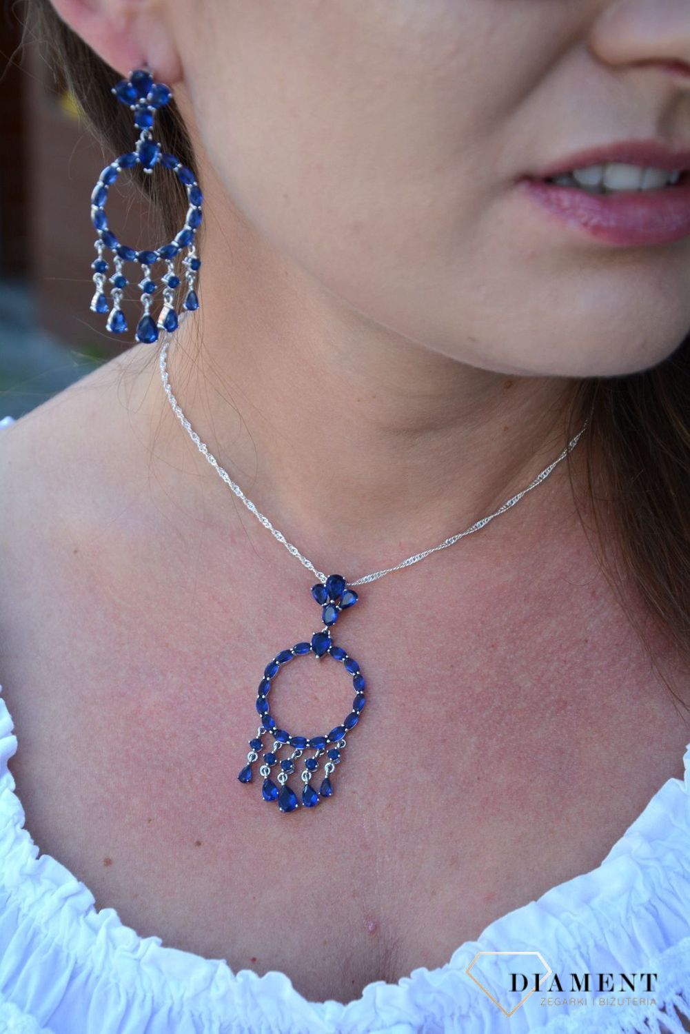Srebrna zawieszka z wiszącymi elementami niebieskie cyrkonie DIA-ZAW-3097-925.jpg