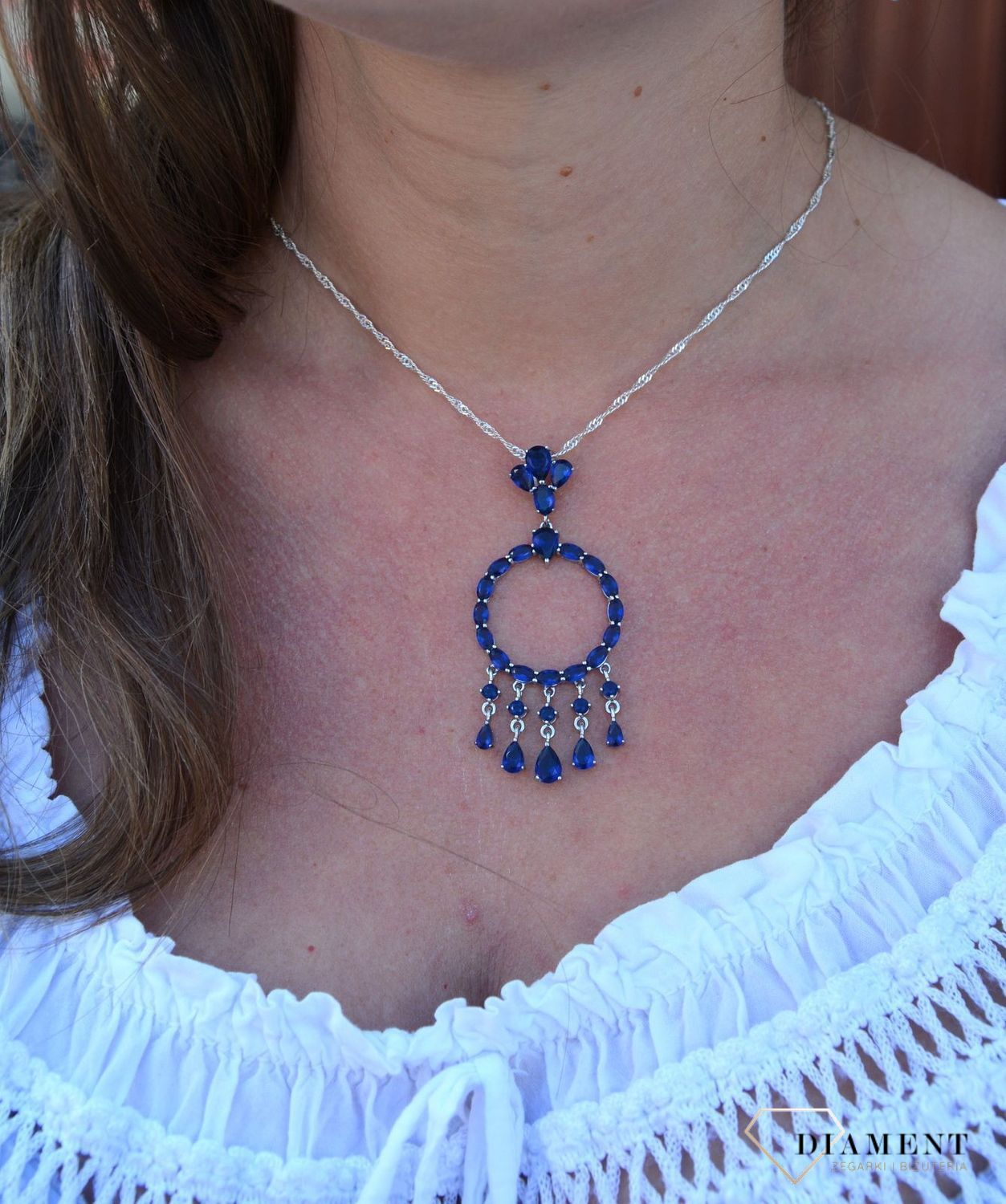 Srebrna zawieszka z wiszącymi elementami niebieskie cyrkonie DIA-ZAW-3097-925.jpg