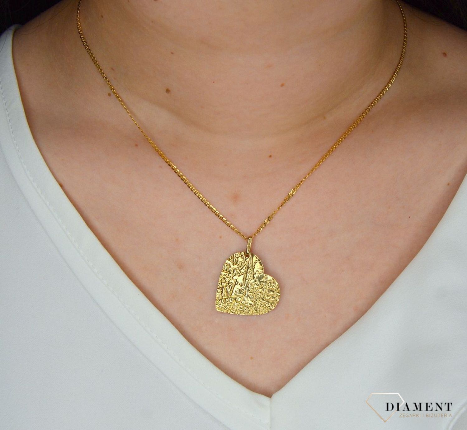 Złota zawieszka 333 serce frezowane DIA-ZAW-3116-333.jpg