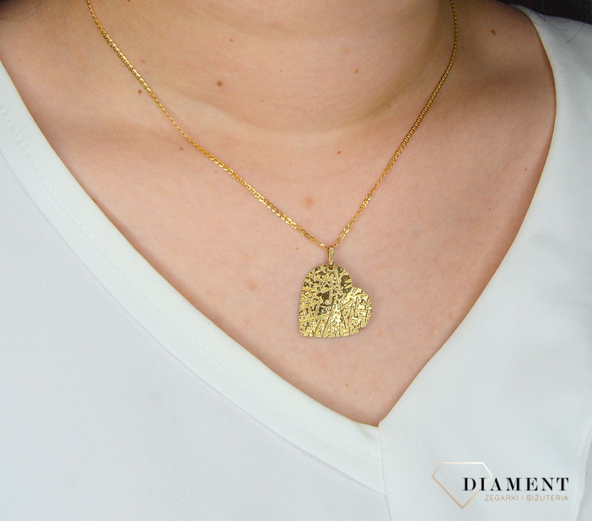 Złota zawieszka 333 serce frezowane DIA-ZAW-3116-333.jpg