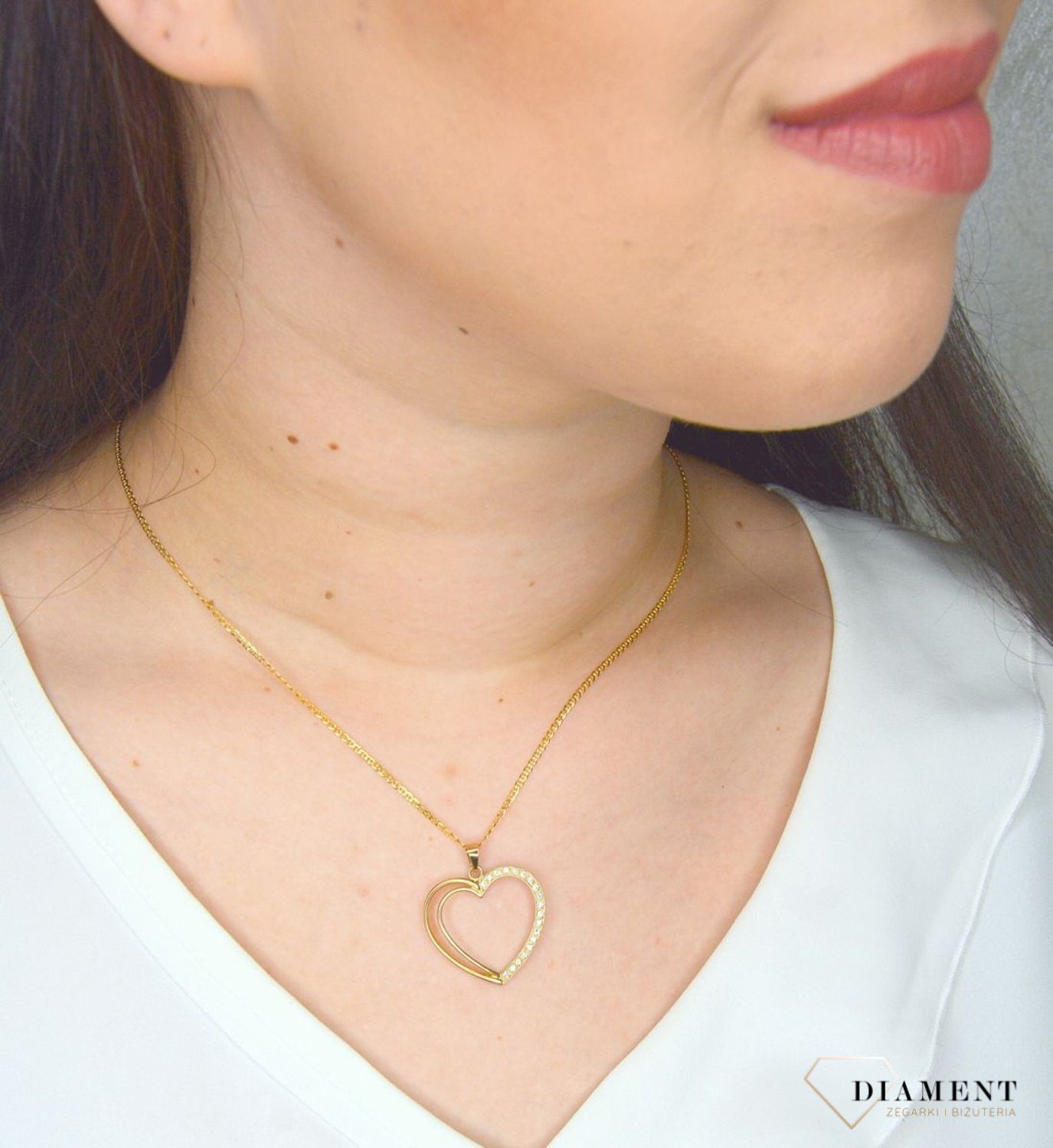 Złota zawieszka 333 serce z cyrkonią DIA-ZAW-3117-333.jpg