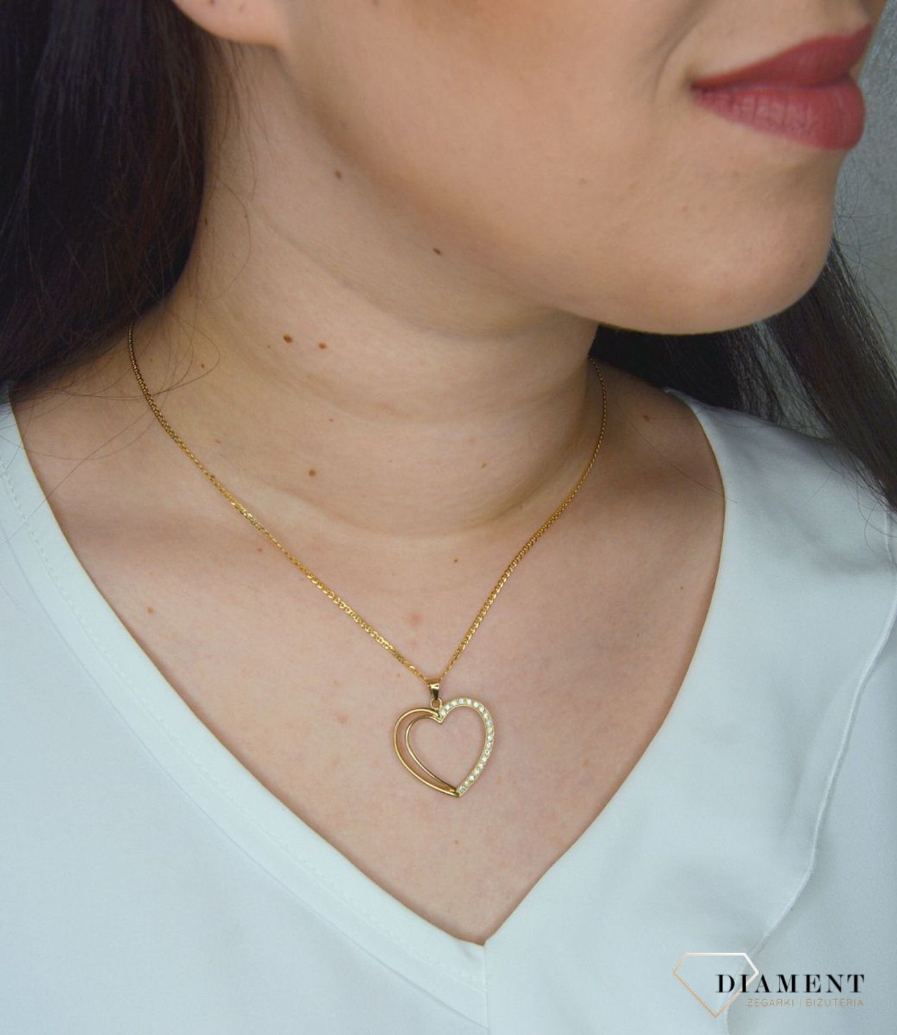 Złota zawieszka 333 serce z cyrkonią DIA-ZAW-3117-333.jpg