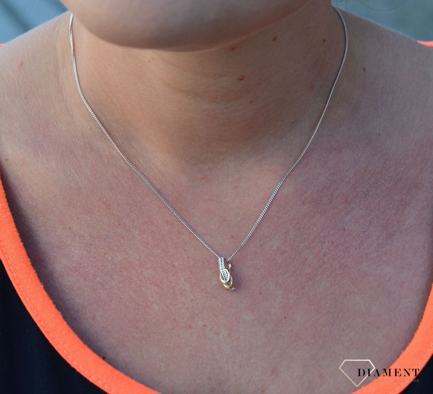 Srebrna zawieszka z cyrkonią i pozłacanymi kółkami DIA-ZAW-3191-925.jpg