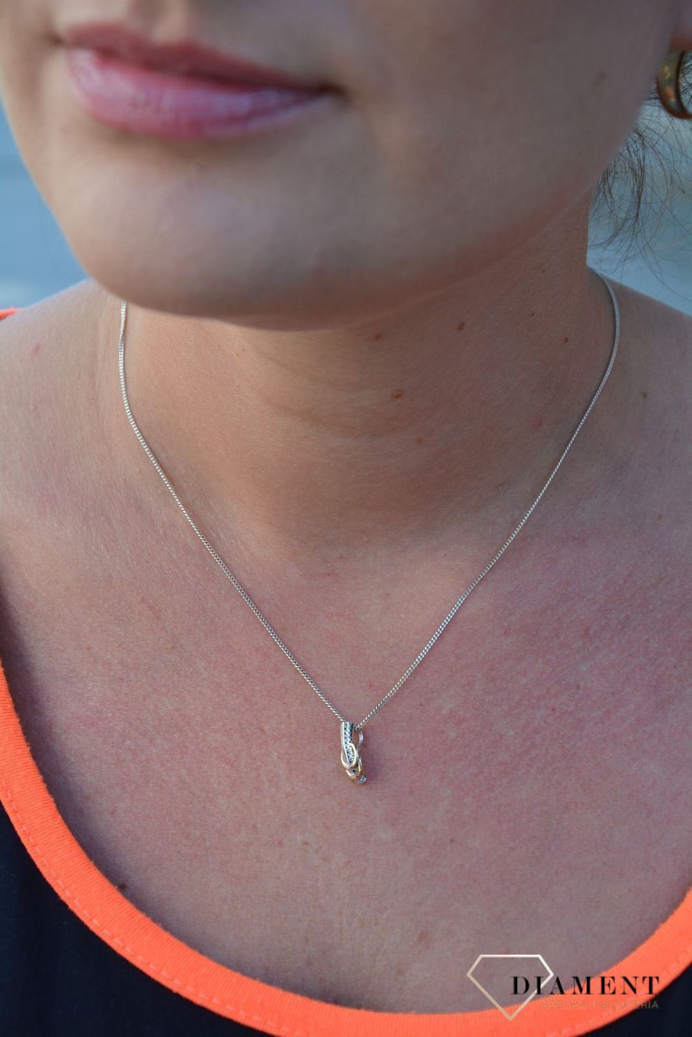 Srebrna zawieszka z cyrkonią i pozłacanymi kółkami DIA-ZAW-3191-925.jpg