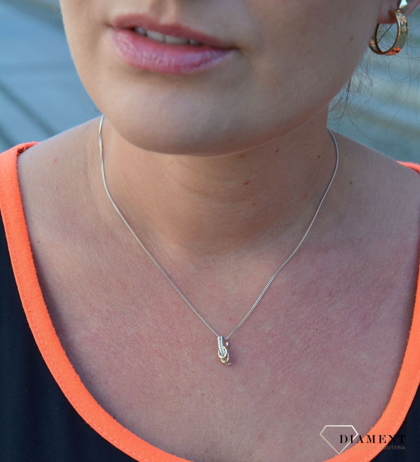 Srebrna zawieszka z cyrkonią i pozłacanymi kółkami DIA-ZAW-3191-925.jpg