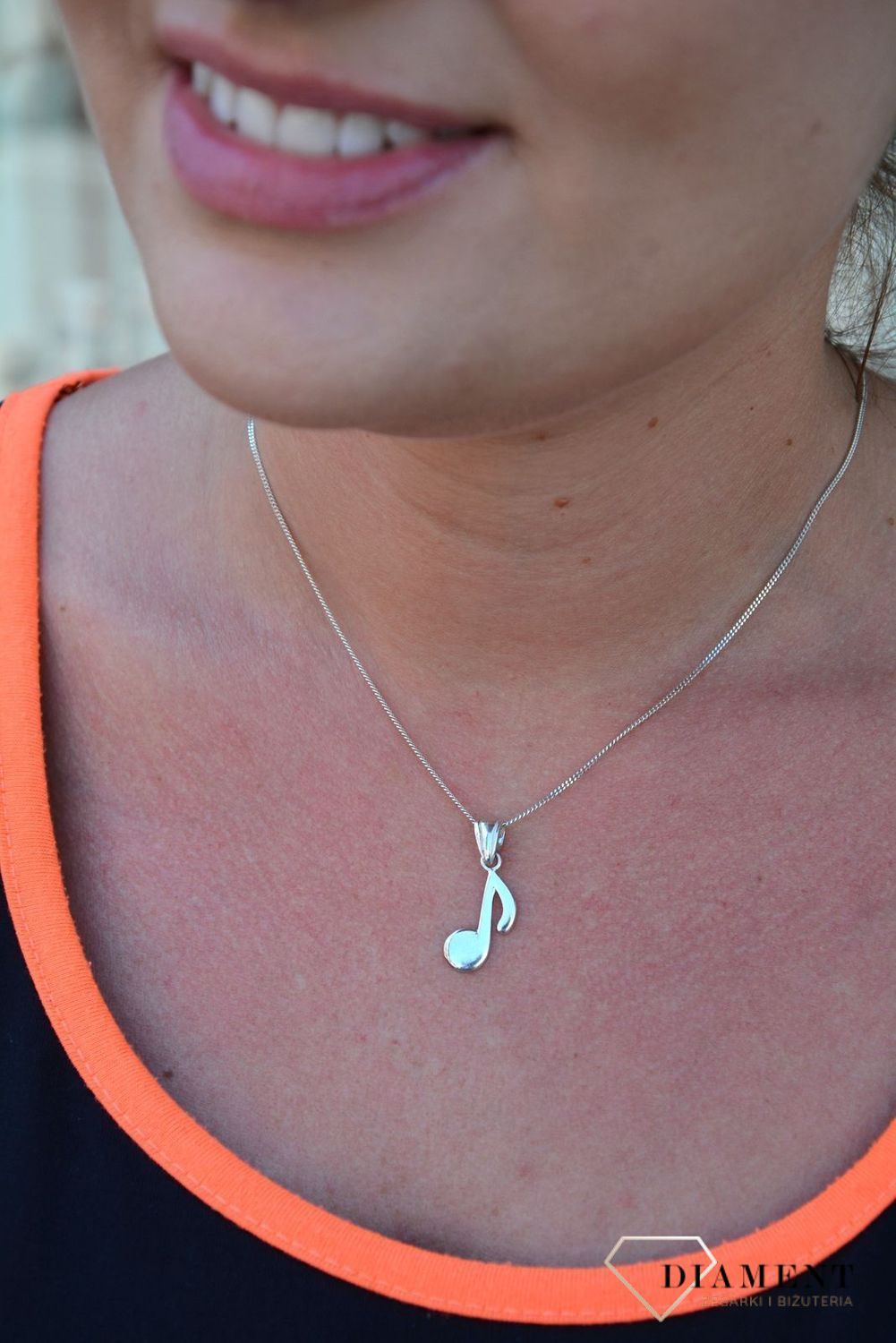 Srebrna zawieszka w kształcie nutki DIA-ZAW-3341-925.jpg