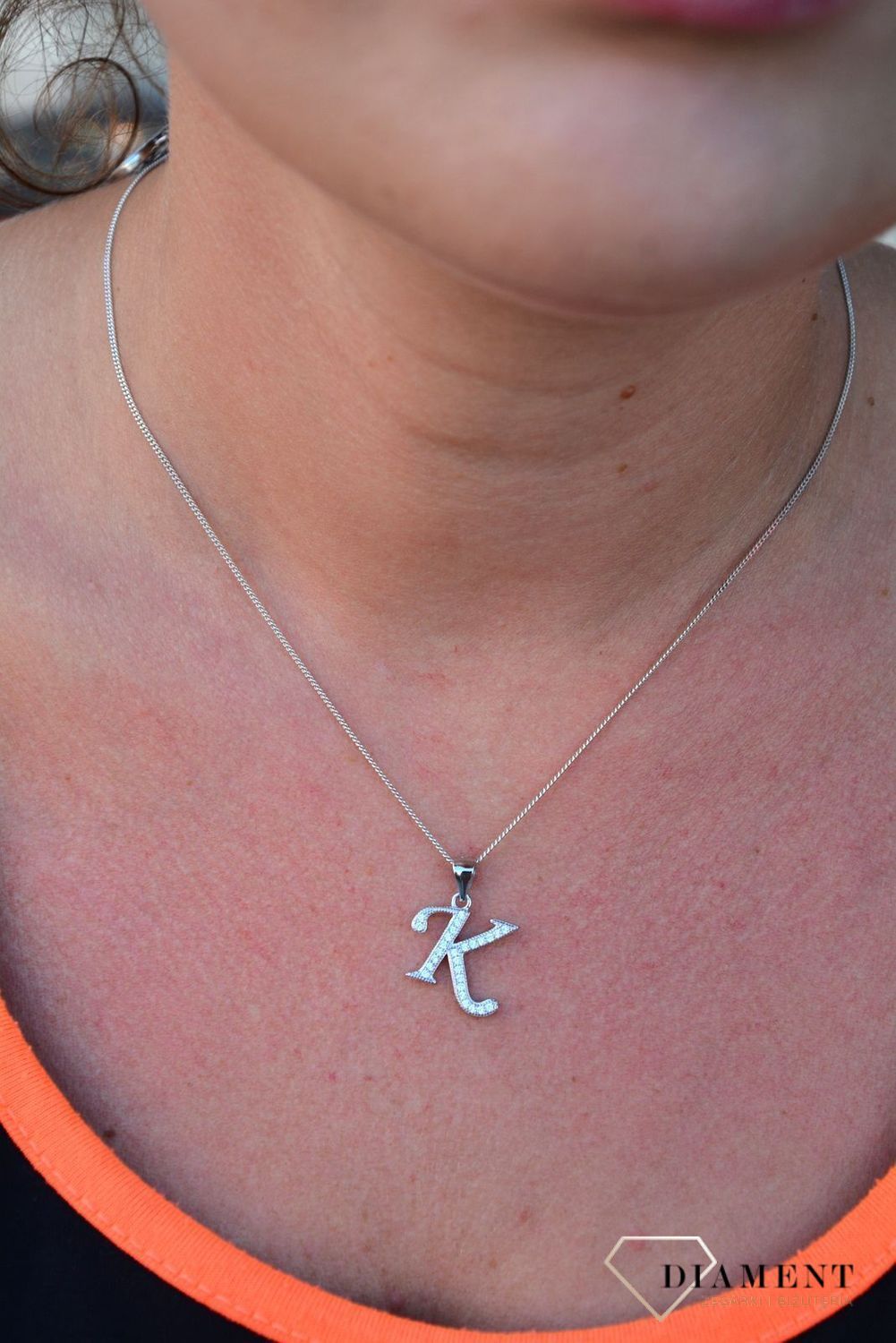 Srebrna zawieszka Literka K z cyrkoniami DIA-ZAW-3530K-925.jpg