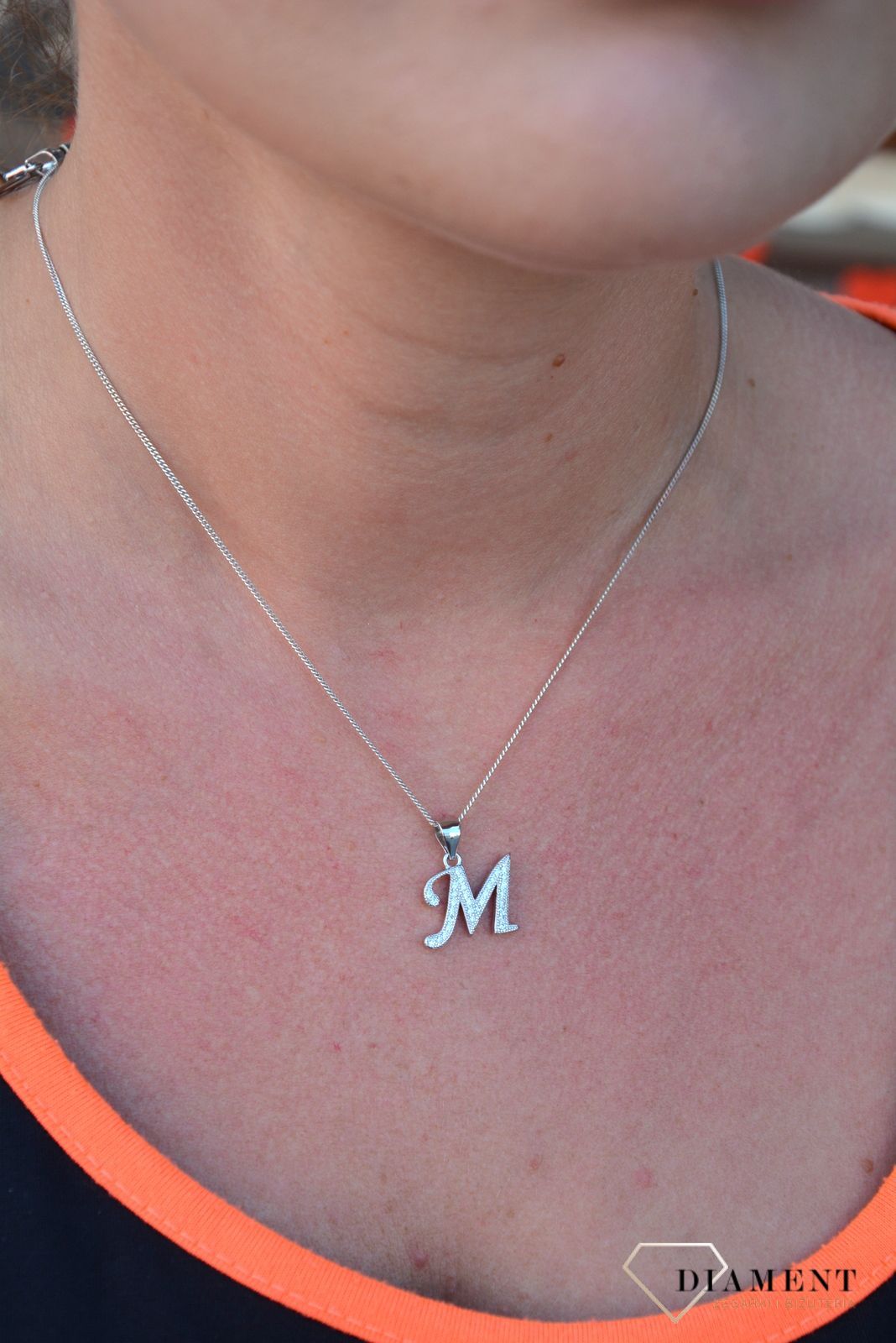 Srebrna zawieszka Literka M z cyrkoniami DIA-ZAW-3530M-925.jpg