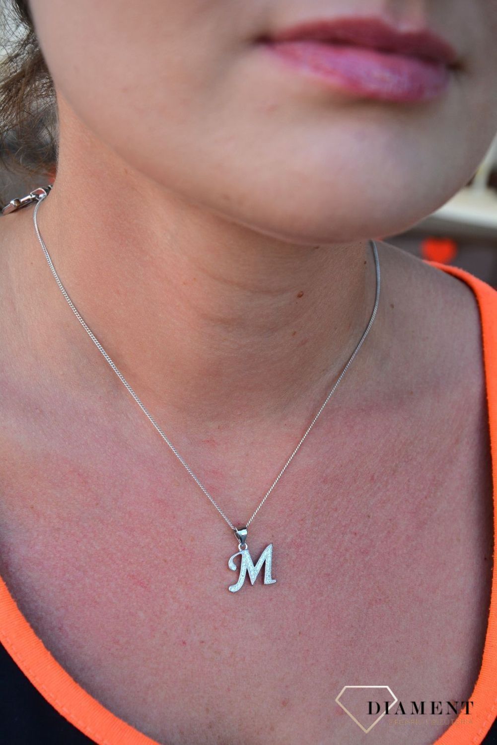 Srebrna zawieszka Literka M z cyrkoniami DIA-ZAW-3530M-925.jpg
