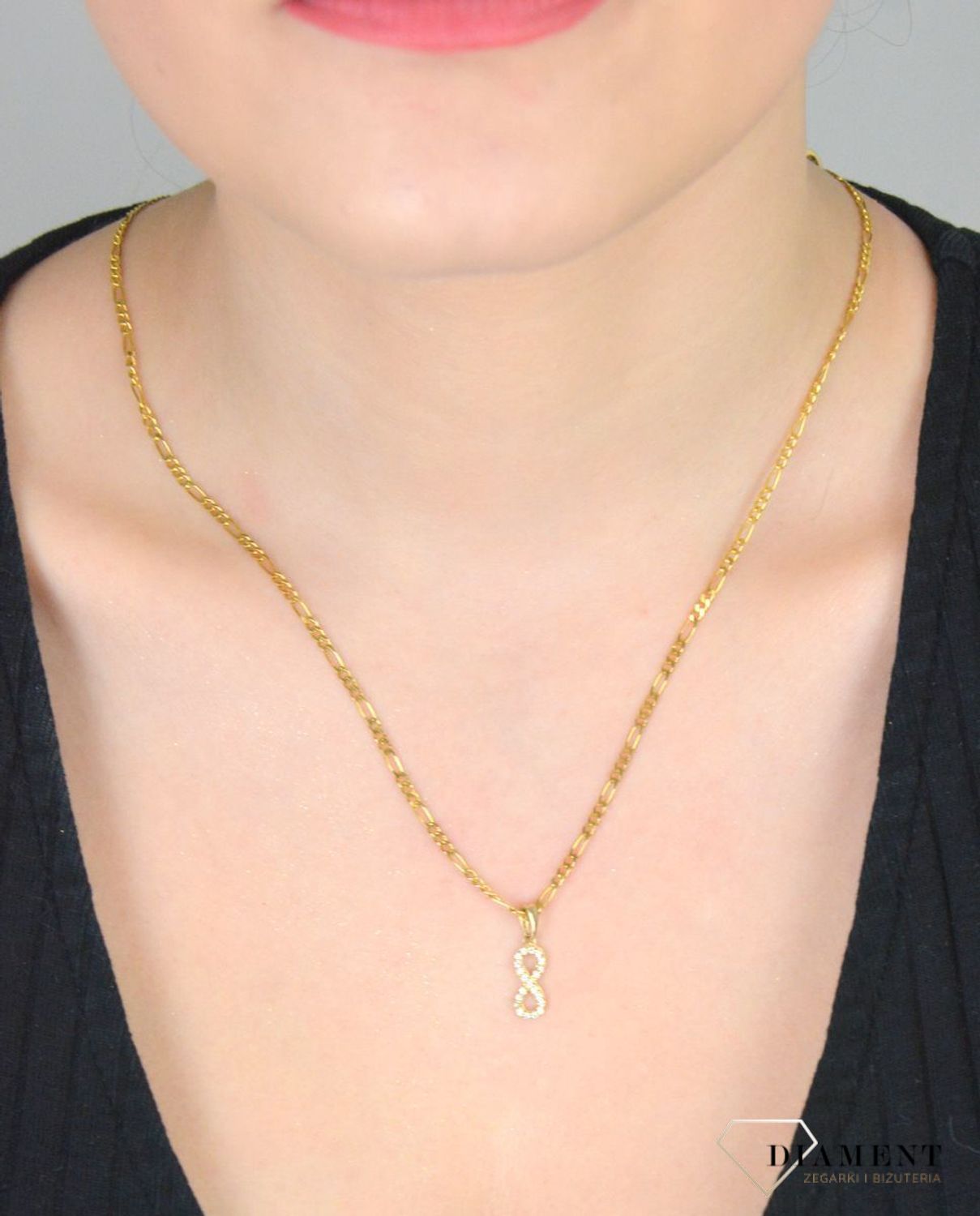 Zawieszka złota nieskończoność z cyrkoniami pr 585, DIA-ZAW-3674-585. Wisiorek został wykonany z wysokiej jakości złota próby 585. Złoto to jeden z najpopularniejszych kruszców, cenione przez 1.jpg