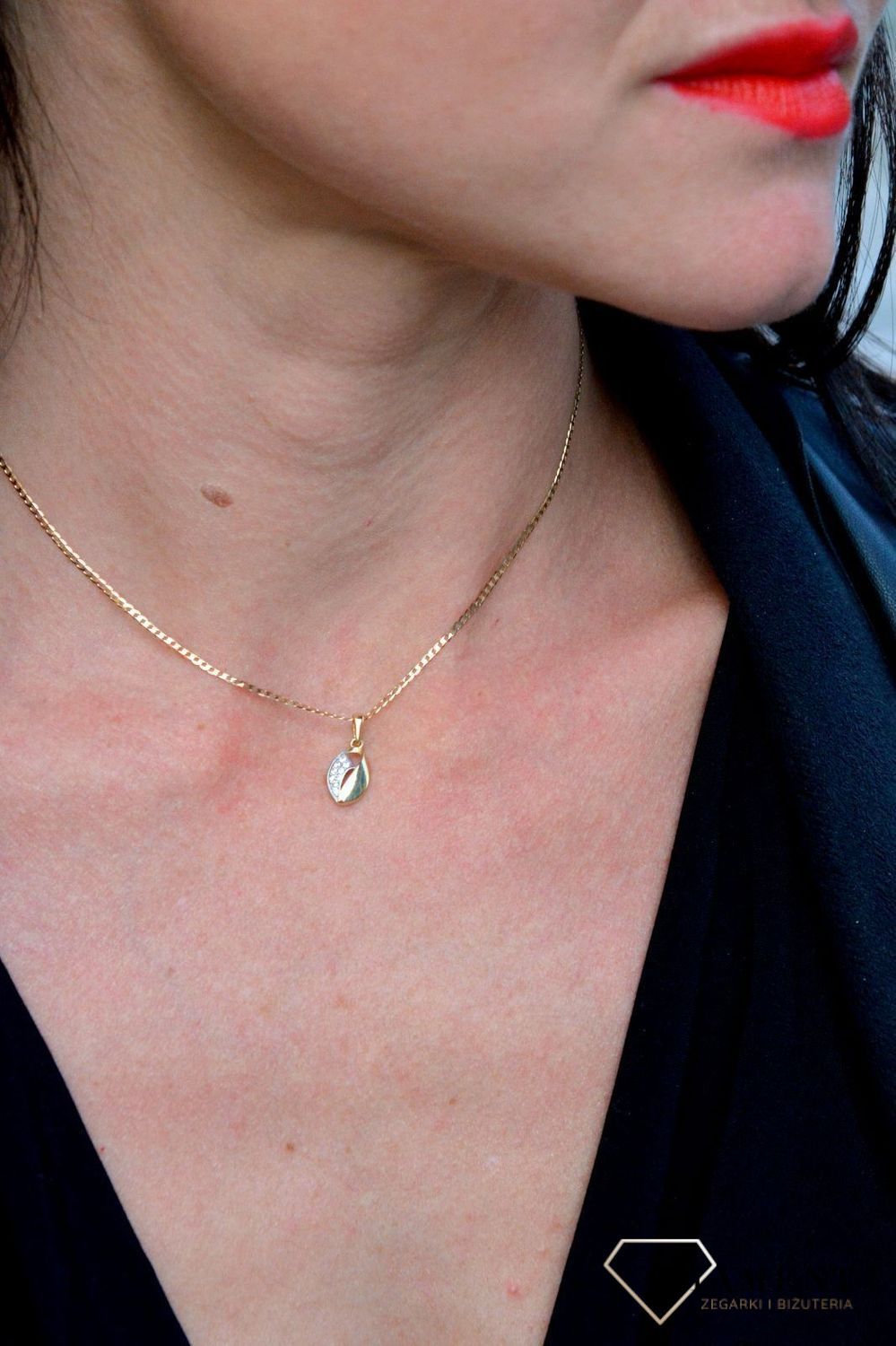 Złota zawieszka 585 owal z błyszczącą cyrkonią DIA-ZAW-4169-585.jpg