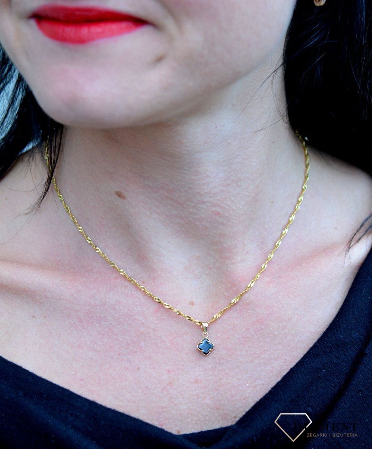 Złota zawieszka 585 koniczynka z onyksem DIA-ZAW-4195-585. Złota zawieszka koniczynka z onyksem wykonana z najwyższej próby 585..jpg