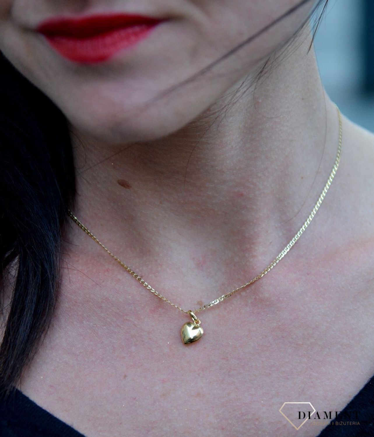 Złota zawieszka 585 wypukłe serce o gładkiej powierzchni DIA-ZAW-4196-585.jpg