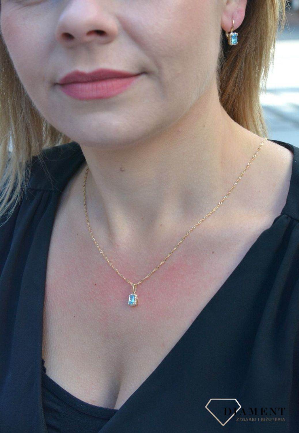 Złota zawieszka klasyczny kształt z błękitną cyrkonią DIA-ZAW-4217-585.jpg