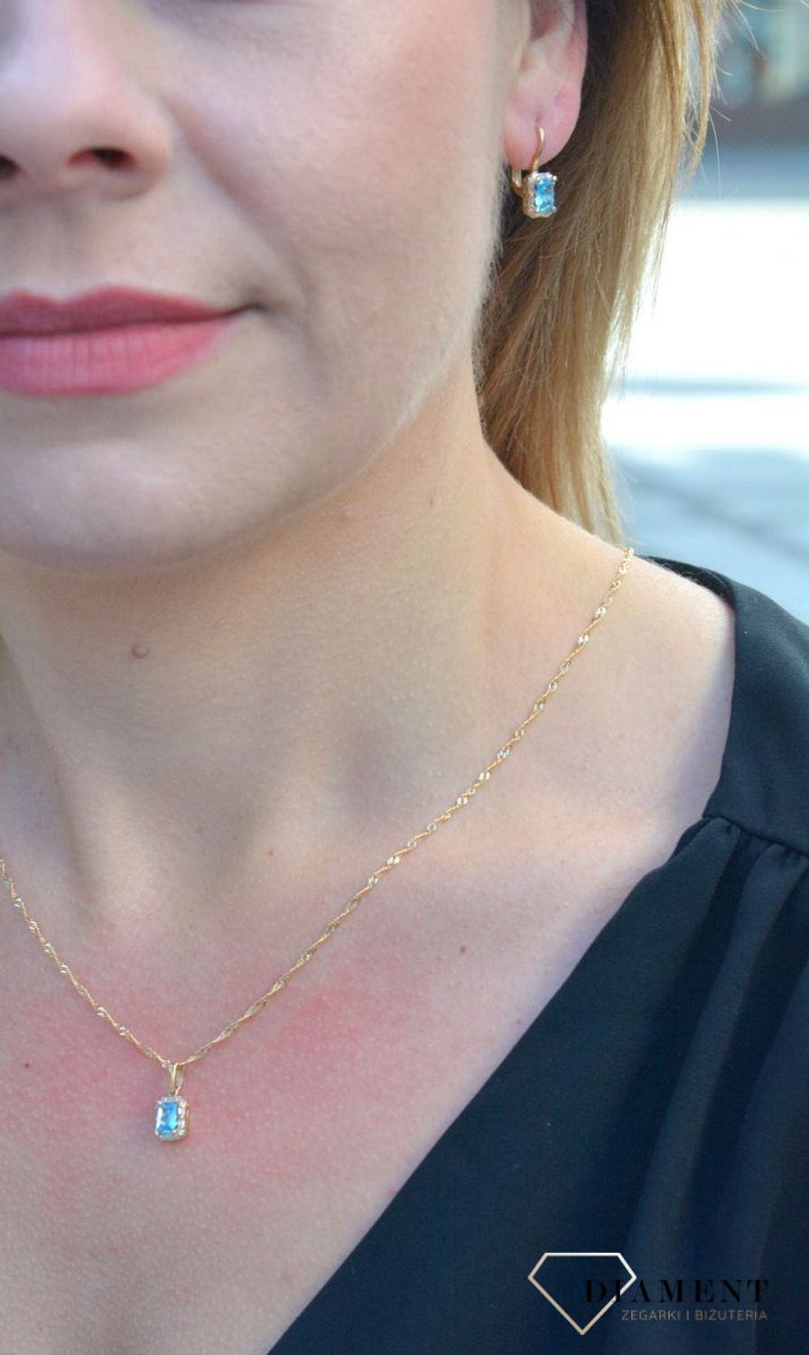 Złota zawieszka klasyczny kształt z błękitną cyrkonią DIA-ZAW-4217-585.jpg