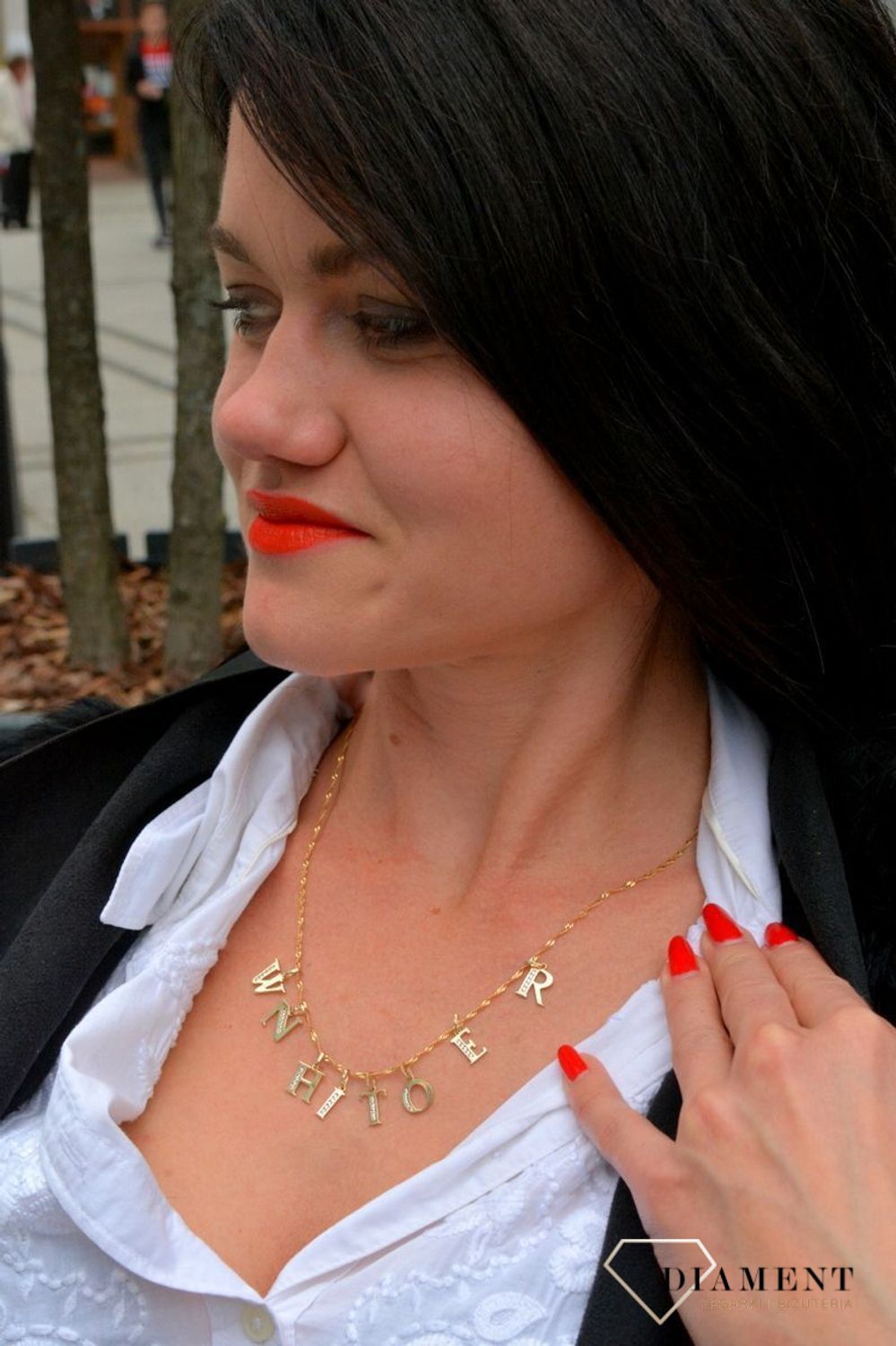 Złota zawieszka w kształcie literki E wykonana z wysokiej próby złota 585. (2).jpg